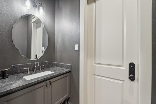 9343 Kai Dr, Beach City, TX 77523 - bathroom with a textured wall and vanity