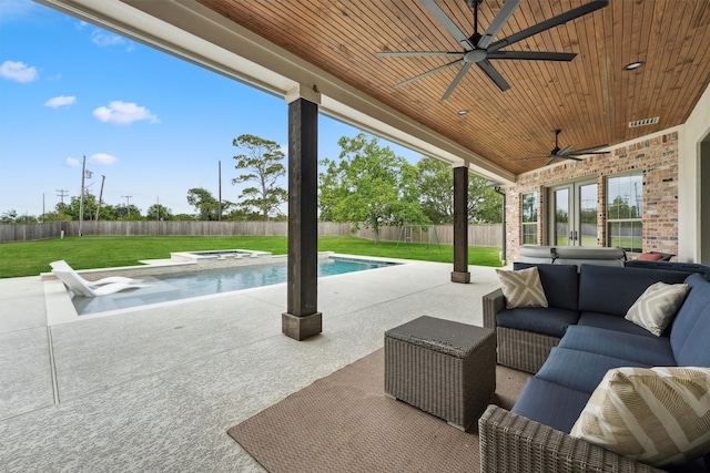 9343 Kai Dr, Beach City, TX 77523 - view of patio featuring a ceiling fan, an outdoor hangout area, an in-ground hot tub, and french doors