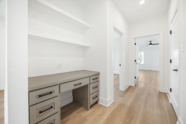 1201 E 27th St, Houston, TX 77009 - unfurnished office with light wood-type flooring, ceiling fan, recessed lighting, baseboards, and built in desk