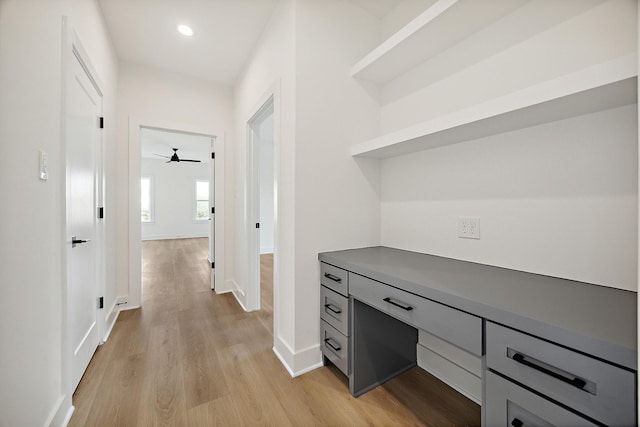 1203 E 27th St, Houston, TX 77009 - unfurnished office featuring light wood-style floors, baseboards, recessed lighting, ceiling fan, and built in study area
