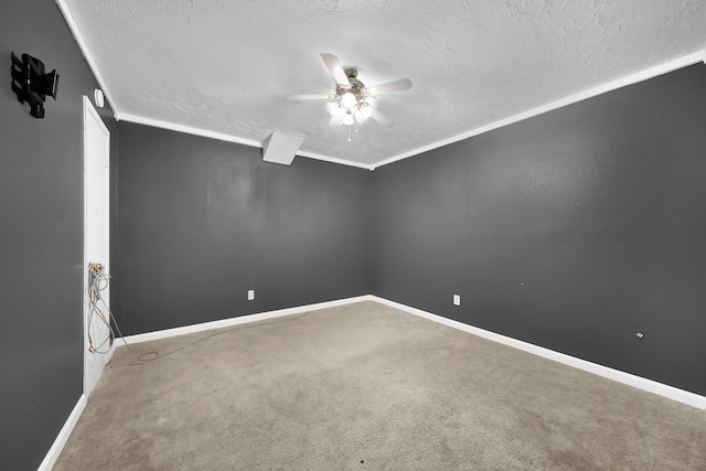 8030 Dodiewood Ln, Houston, TX 77086 - carpeted empty room with a textured ceiling, a ceiling fan, and baseboards