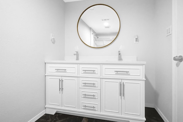 8030 Dodiewood Ln, Houston, TX 77086 - full bathroom featuring baseboards, double vanity, and marble finish flooring
