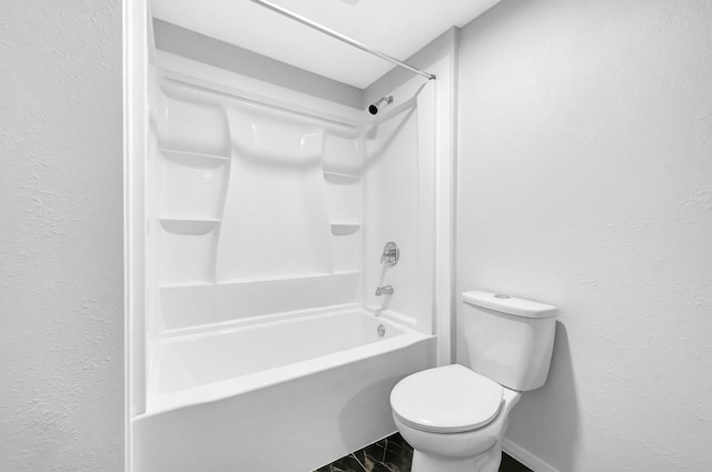 8030 Dodiewood Ln, Houston, TX 77086 - full bathroom featuring tub / shower combination, toilet, and a textured wall