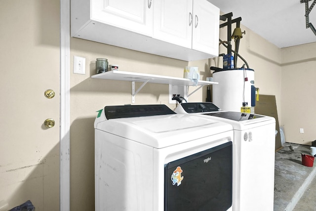 8030 Dodiewood Ln, Houston, TX 77086 - washroom featuring washer and clothes dryer, cabinet space, and water heater