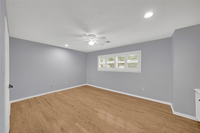 16111 Maplehurst Dr, Houston, TX 77379 - empty room with ceiling fan, light wood-style flooring, baseboards, and recessed lighting