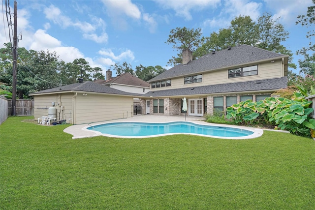 16111 Maplehurst Dr, Houston, TX 77379 - view of swimming pool featuring french doors and a patio