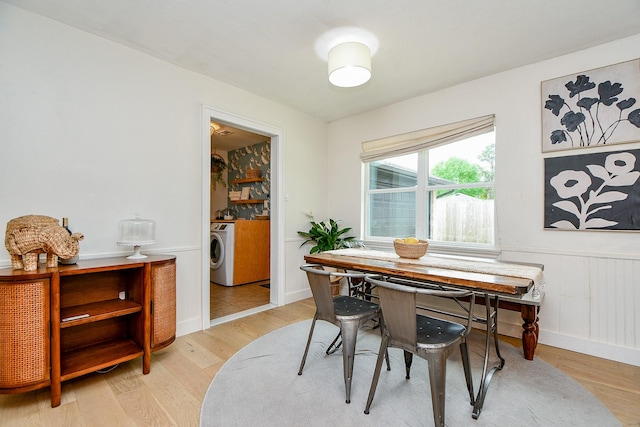 2735 Triway Ln, Houston, TX 77043 - dining space featuring light wood finished floors and washer / dryer