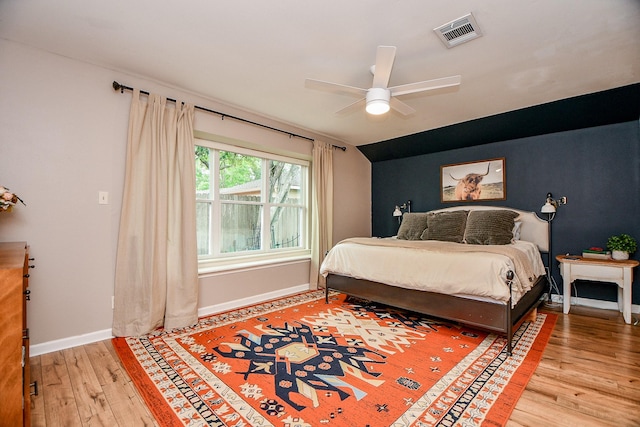 2735 Triway Ln, Houston, TX 77043 - bedroom featuring wood finished floors, baseboards, and a ceiling fan