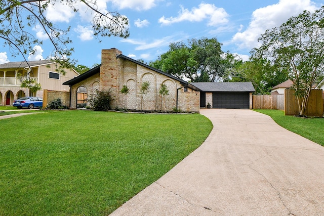 2735 Triway Ln, Houston, TX 77043 - view of front facade featuring concrete driveway, brick siding, and a chimney