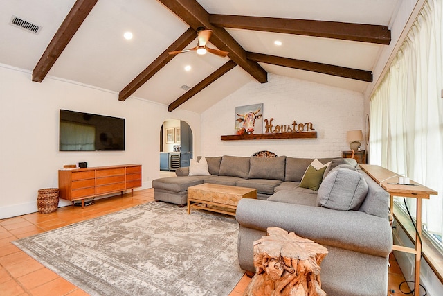 2735 Triway Ln, Houston, TX 77043 - tiled living room featuring arched walkways, a ceiling fan, recessed lighting, and baseboards