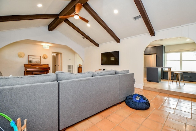 2735 Triway Ln, Houston, TX 77043 - living room with arched walkways, light tile patterned flooring, ceiling fan, and recessed lighting