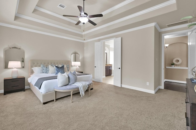 13518 Ambler Springs Dr, Tomball, TX 77377 - carpeted bedroom featuring a raised ceiling, ornamental molding, baseboards, ensuite bathroom, and a ceiling fan