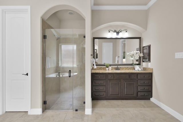 13518 Ambler Springs Dr, Tomball, TX 77377 - bathroom with vanity, baseboards, a stall shower, crown molding, and tile patterned floors