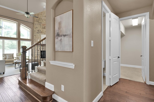 13518 Ambler Springs Dr, Tomball, TX 77377 - hall featuring wood-type flooring, stairs, and baseboards