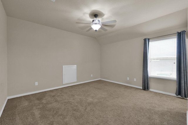 13518 Ambler Springs Dr, Tomball, TX 77377 - spare room with carpet, a ceiling fan, baseboards, and vaulted ceiling