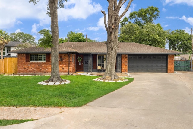 10228 Brinwood Dr, Houston, TX 77043 - single story home featuring brick siding, driveway, a garage, and a shingled roof