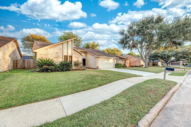 2543 Sage Brush Ln, Sugar Land, TX 77479 - view of side of home with brick siding, a garage, and concrete driveway