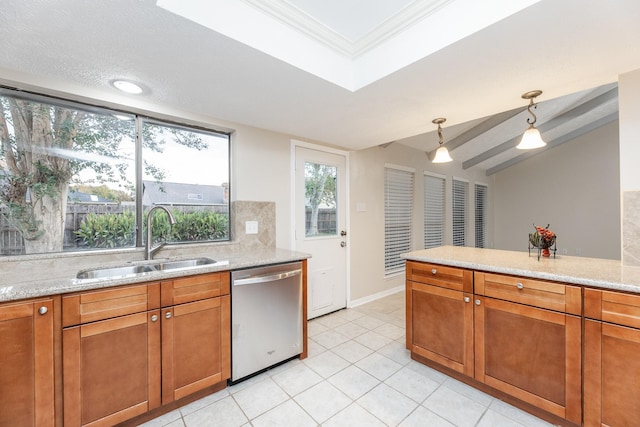 2543 Sage Brush Ln, Sugar Land, TX 77479 - kitchen with dishwasher, a sink, brown cabinets, decorative light fixtures, and lofted ceiling