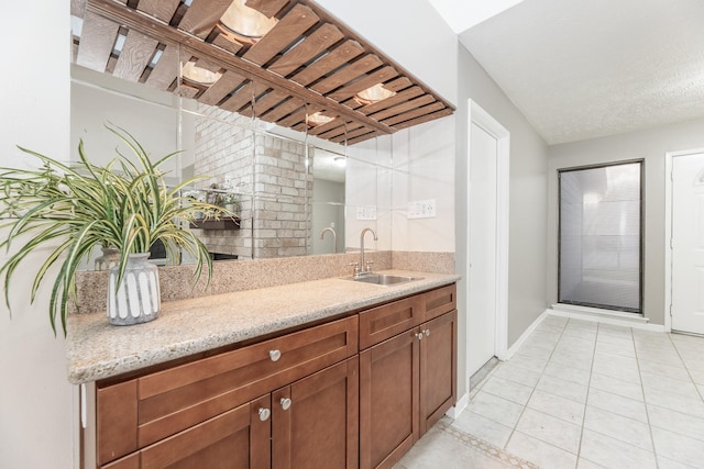 2543 Sage Brush Ln, Sugar Land, TX 77479 - indoor wet bar featuring light tile patterned floors and baseboards