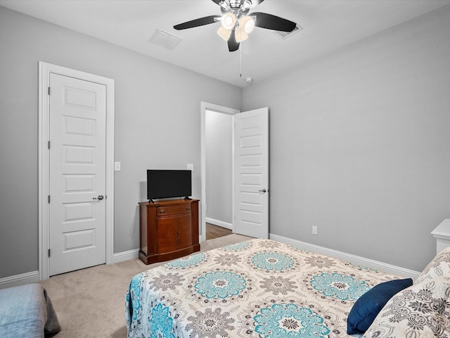 2314 Navo Ln, League City, TX 77573 - carpeted bedroom with baseboards and a ceiling fan