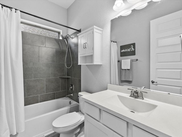 2314 Navo Ln, League City, TX 77573 - full bath with vanity, toilet, shower / bath combo with shower curtain, and a textured wall