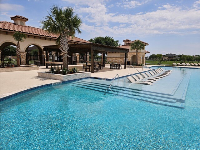 2314 Navo Ln, League City, TX 77573 - community pool with a patio and a gazebo
