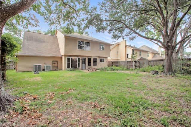 3218 Barkers Forest Ln, Houston, TX 77084 - rear view of house with central air condition unit