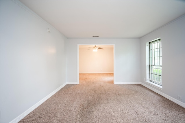 15319 Paseo Del Rey Dr, Houston, TX 77083 - unfurnished room featuring carpet, baseboards, crown molding, and a ceiling fan