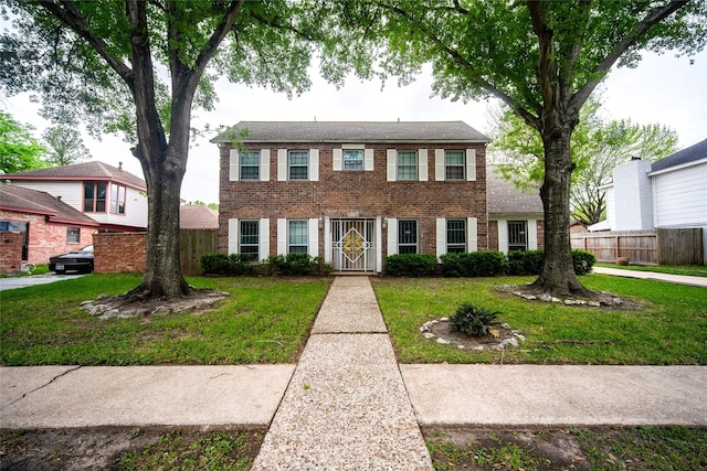 15319 Paseo Del Rey Dr, Houston, TX 77083 - colonial-style house featuring brick siding
