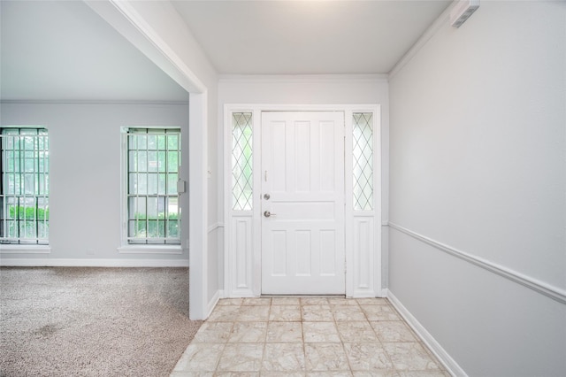 15319 Paseo Del Rey Dr, Houston, TX 77083 - foyer entrance featuring crown molding and baseboards