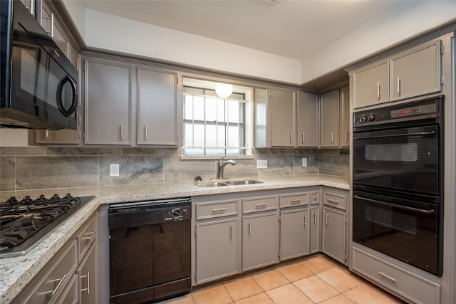 15319 Paseo Del Rey Dr, Houston, TX 77083 - kitchen featuring black appliances, a sink, gray cabinets, and light tile patterned flooring