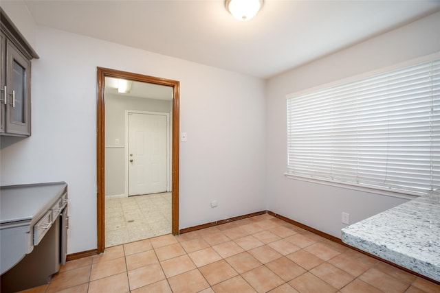 15319 Paseo Del Rey Dr, Houston, TX 77083 - unfurnished dining area featuring baseboards