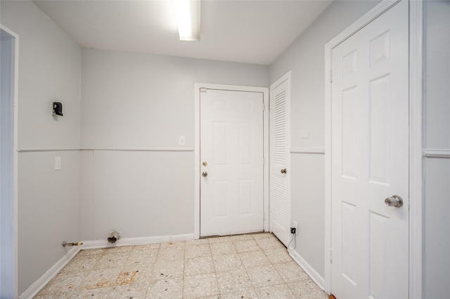 15319 Paseo Del Rey Dr, Houston, TX 77083 - laundry room featuring light flooring, baseboards, and electric dryer hookup