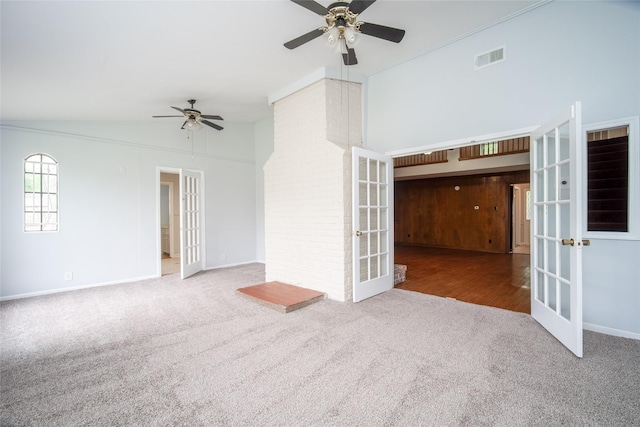 15319 Paseo Del Rey Dr, Houston, TX 77083 - spare room featuring french doors, carpet flooring, a ceiling fan, baseboards, and high vaulted ceiling