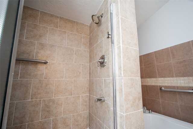 15319 Paseo Del Rey Dr, Houston, TX 77083 - full bathroom featuring a tile shower and a bathtub