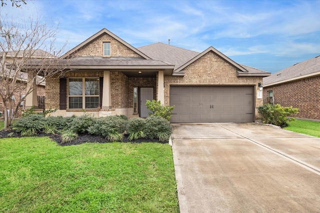 3707 Daintree Park Dr, Katy, TX 77494 - view of front of property with brick siding, an attached garage, driveway, a front lawn, and a shingled roof