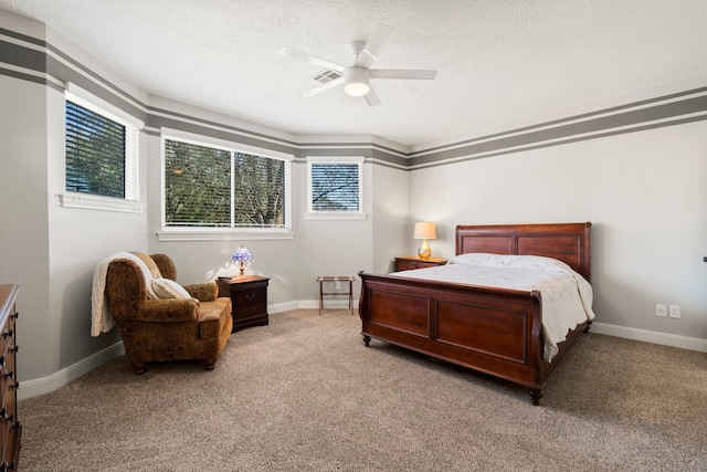 11407 Squiredale Dr, Houston, TX 77070 - bedroom with multiple windows, a textured ceiling, carpet floors, baseboards, and ceiling fan