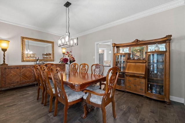 11407 Squiredale Dr, Houston, TX 77070 - dining room featuring crown molding, a chandelier, and dark wood finished floors
