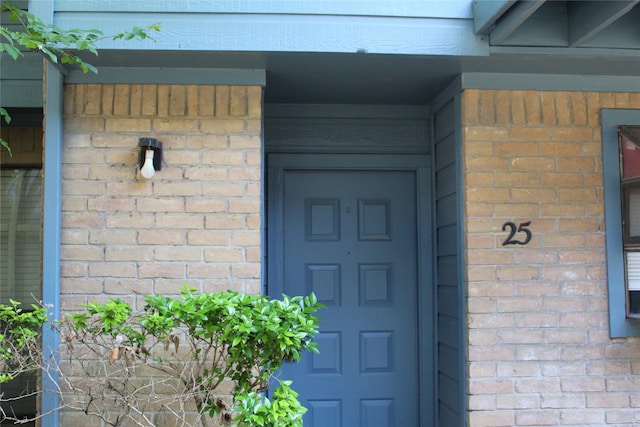 10001 Westpark Dr Unit 25, Houston, TX 77042 - view of exterior entry with brick siding