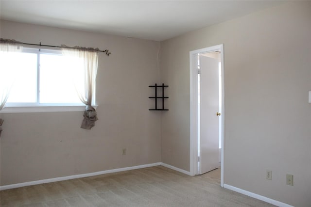 10001 Westpark Dr Unit 25, Houston, TX 77042 - unfurnished room featuring light colored carpet and baseboards