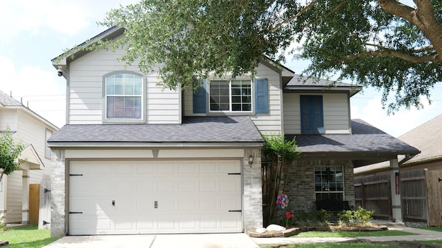 11810 Sardis Lake Dr, Tomball, TX 77375 - view of front of property with concrete driveway, an attached garage, and a shingled roof