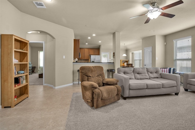 2602 Tacoma Springs Dr, Conroe, TX 77304 - living area with ceiling fan, recessed lighting, arched walkways, and baseboards