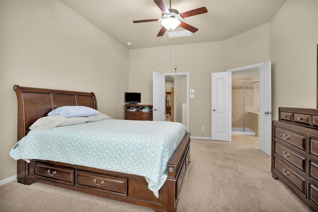 2602 Tacoma Springs Dr, Conroe, TX 77304 - bedroom with light carpet, lofted ceiling, baseboards, a ceiling fan, and ensuite bath