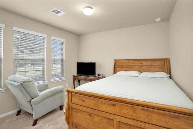 2602 Tacoma Springs Dr, Conroe, TX 77304 - bedroom with light carpet and baseboards