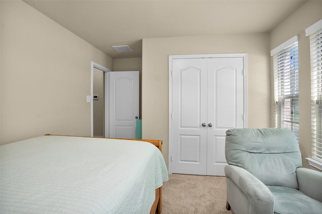 2602 Tacoma Springs Dr, Conroe, TX 77304 - bedroom featuring light colored carpet and a closet