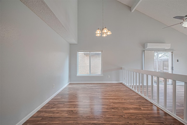 1806 Foxlake Dr, Houston, TX 77084 - spare room featuring a chandelier, ceiling fan, wood finished floors, baseboards, and a textured ceiling