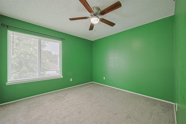 1806 Foxlake Dr, Houston, TX 77084 - carpeted empty room featuring a textured ceiling, ceiling fan, and baseboards