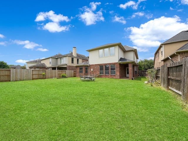 4015 Candle Cove Ct, Sugar Land, TX 77479 - back of house with brick siding