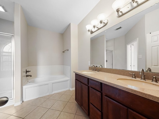 4015 Candle Cove Ct, Sugar Land, TX 77479 - full bath featuring a shower stall, tile patterned floors, a bath, double vanity, and baseboards