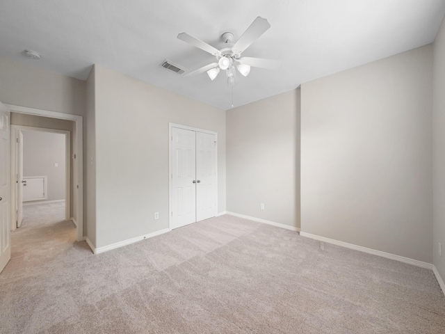 4015 Candle Cove Ct, Sugar Land, TX 77479 - unfurnished bedroom featuring light colored carpet, a closet, and baseboards